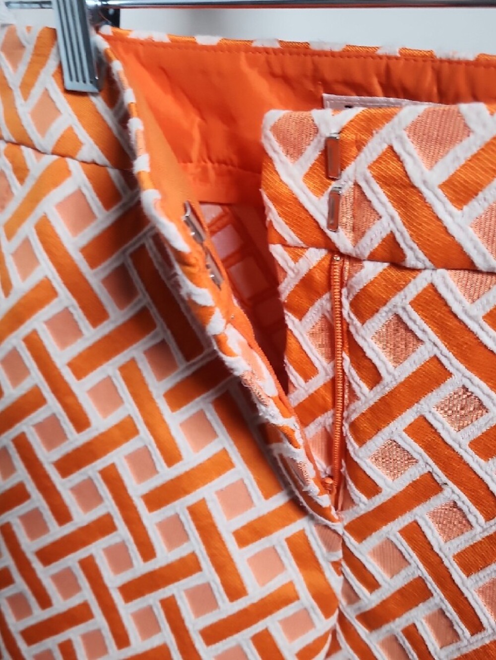 TRINA TURK | Orange and White Geometric Print Women's Shorts - Picture 8 of 8